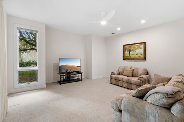 living room featuring recessed lighting, carpet, visible vents, and baseboards