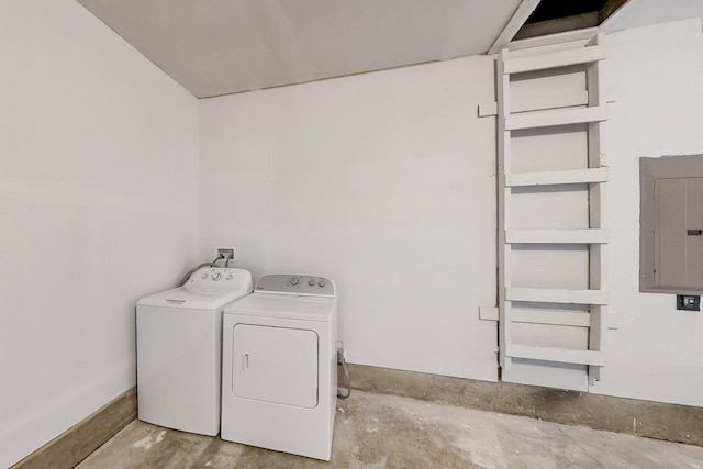 laundry area with electric panel, baseboards, and separate washer and dryer