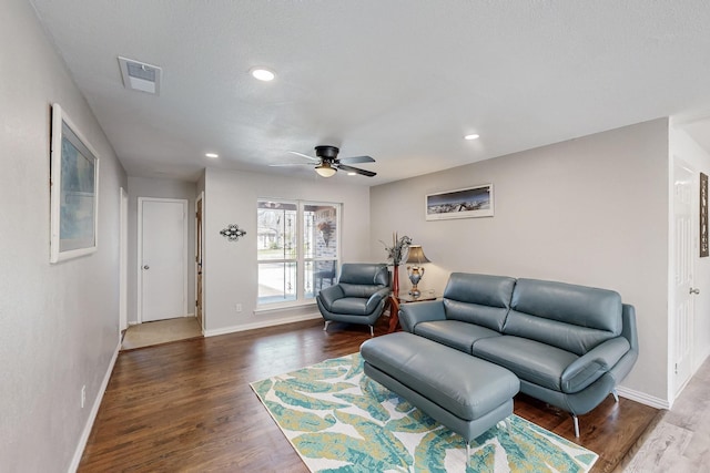 living room with visible vents, a ceiling fan, wood finished floors, recessed lighting, and baseboards