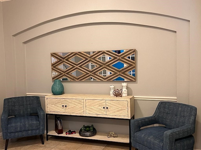 living area with tile patterned flooring