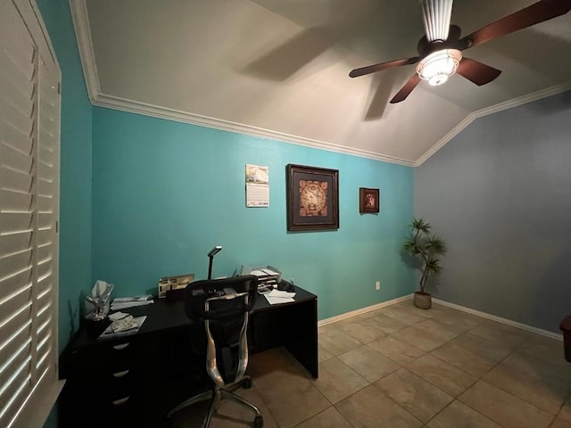 office area featuring lofted ceiling, ceiling fan, baseboards, ornamental molding, and tile patterned floors