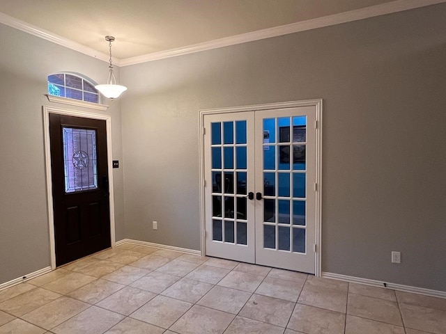 foyer featuring light tile patterned floors, baseboards, crown molding, and french doors