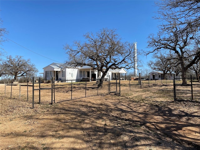 view of yard featuring a fenced front yard and a gate