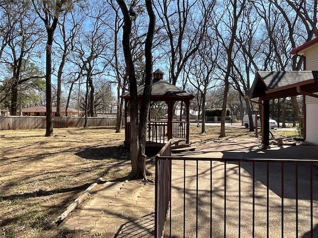 view of yard featuring fence and a gazebo