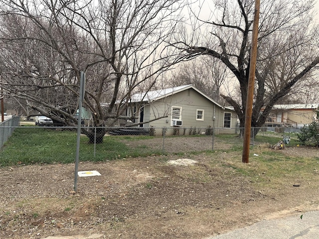 view of front of home featuring fence private yard