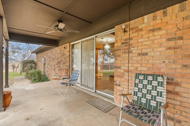 view of patio featuring ceiling fan