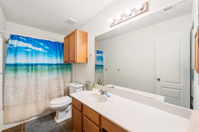 full bathroom featuring toilet, tile patterned flooring, vanity, and visible vents