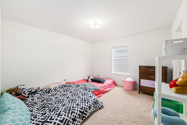 bedroom featuring carpet