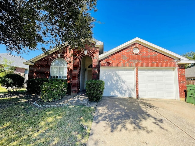 single story home with a garage, driveway, and brick siding