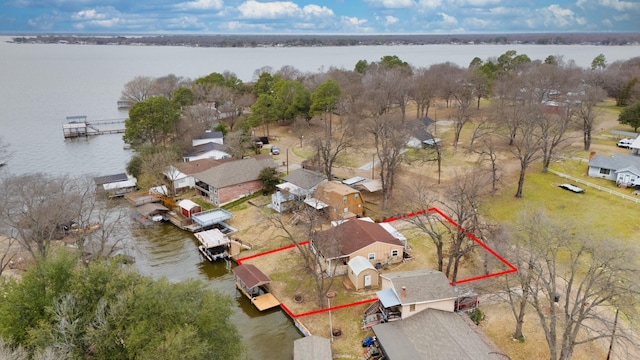 aerial view featuring a residential view and a water view