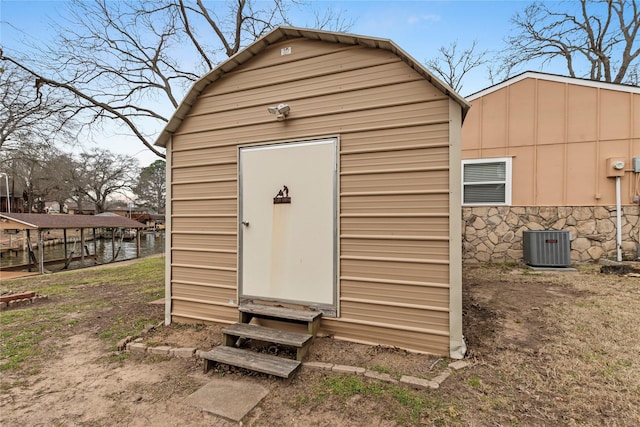 view of shed featuring cooling unit and entry steps