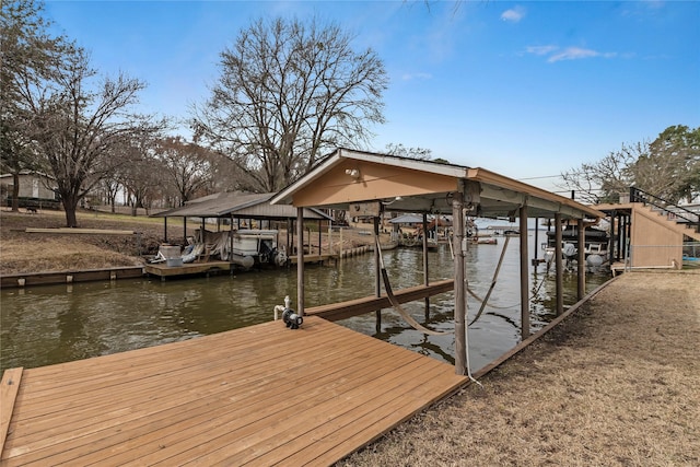 dock area featuring a water view and boat lift