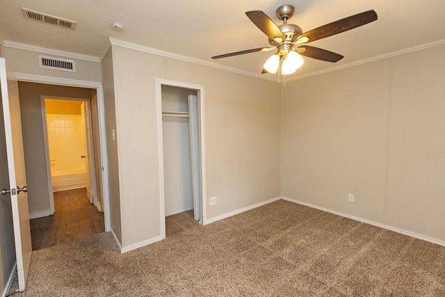 unfurnished bedroom featuring ceiling fan, ornamental molding, carpet flooring, and visible vents