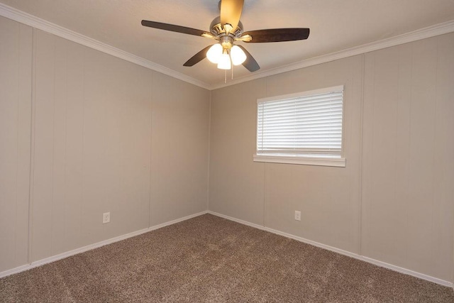 empty room featuring carpet, crown molding, and ceiling fan