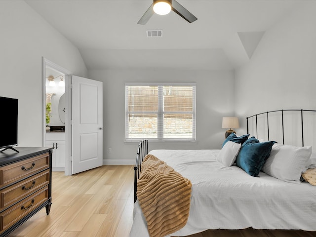 bedroom featuring baseboards, visible vents, a ceiling fan, vaulted ceiling, and light wood-type flooring