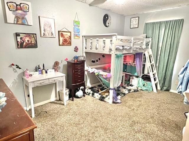 carpeted bedroom featuring a textured ceiling