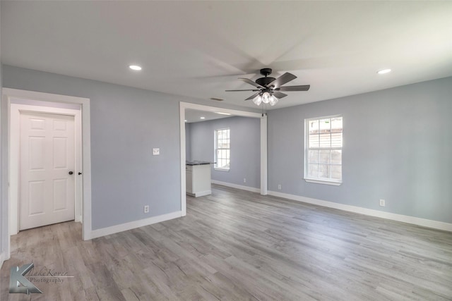 unfurnished bedroom with visible vents, baseboards, light wood-style flooring, ceiling fan, and recessed lighting