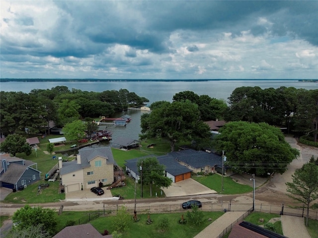 drone / aerial view with a water view