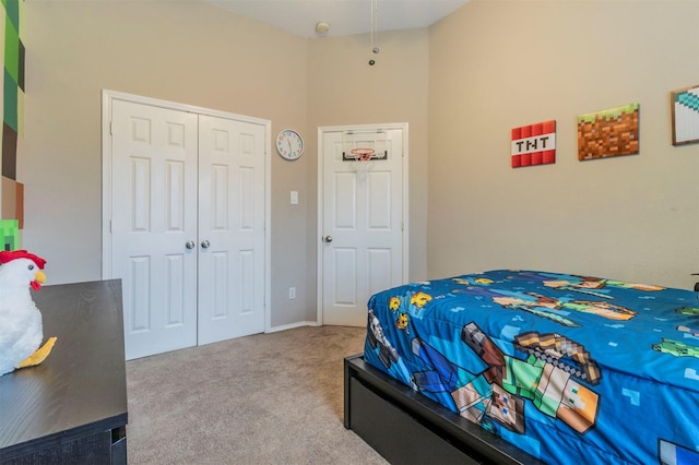 carpeted bedroom with a closet