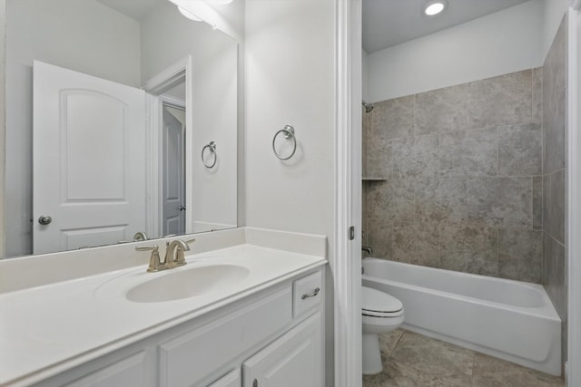 full bathroom with toilet, tile patterned flooring, tub / shower combination, and vanity