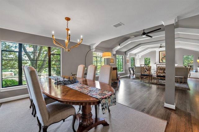 dining area featuring wood finished floors, visible vents, and a healthy amount of sunlight