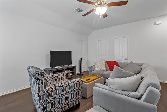 living room with baseboards, visible vents, a ceiling fan, dark wood-type flooring, and vaulted ceiling