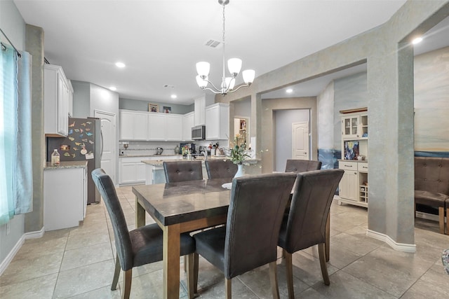 dining room featuring light tile patterned floors, recessed lighting, visible vents, a chandelier, and baseboards