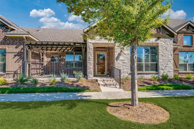 doorway to property with stone siding, brick siding, a yard, and a pergola