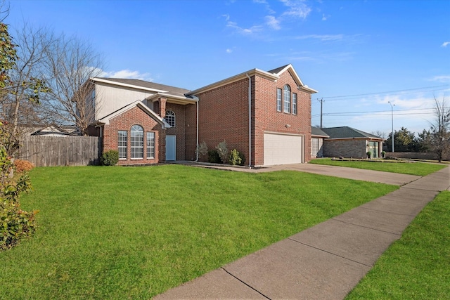 view of front of property featuring brick siding, a front lawn, an attached garage, and fence