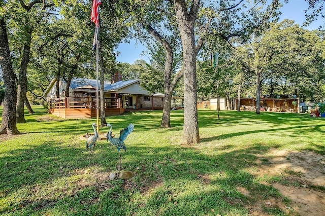 view of yard with a deck