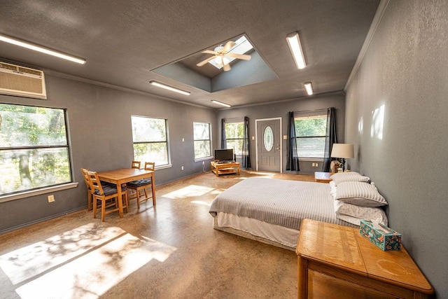 bedroom featuring concrete flooring, a textured wall, a textured ceiling, a wall mounted air conditioner, and crown molding