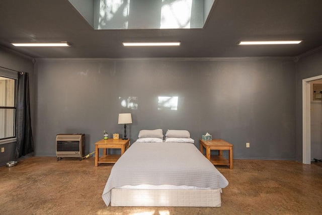 bedroom featuring heating unit, baseboards, and ornamental molding