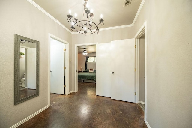 hallway with baseboards, visible vents, concrete flooring, and ornamental molding