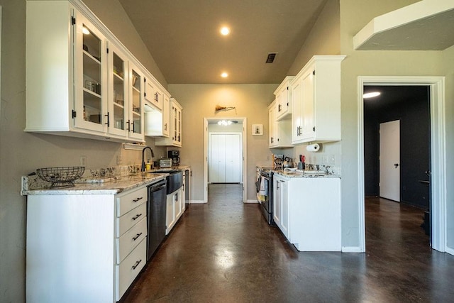 kitchen featuring dishwasher, glass insert cabinets, concrete flooring, stainless steel stove, and a sink