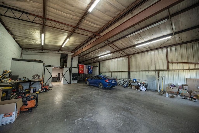 garage featuring metal wall