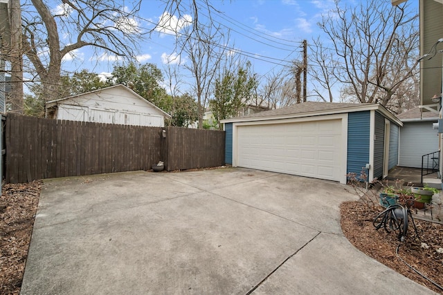 detached garage with fence