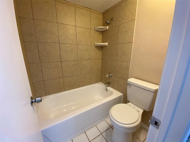 bathroom with tile patterned flooring, toilet, and shower / bathtub combination