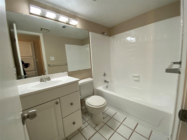 bathroom with visible vents, toilet, shower / tub combination, tile patterned flooring, and vanity