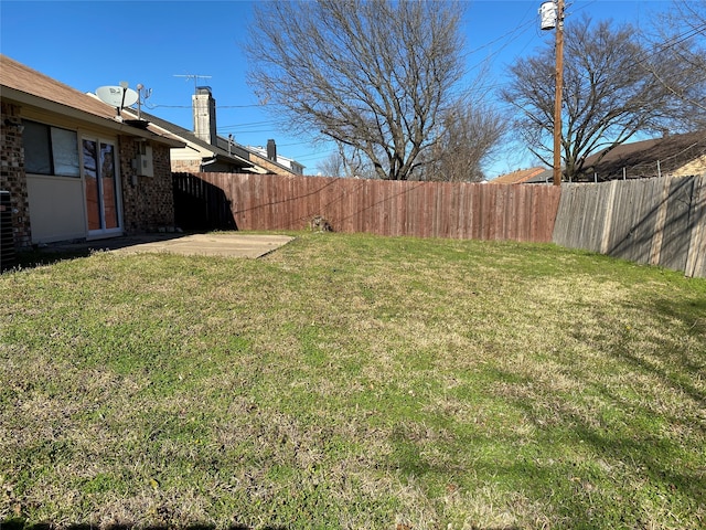 view of yard with fence