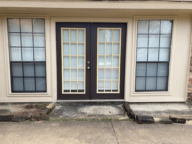 property entrance featuring french doors