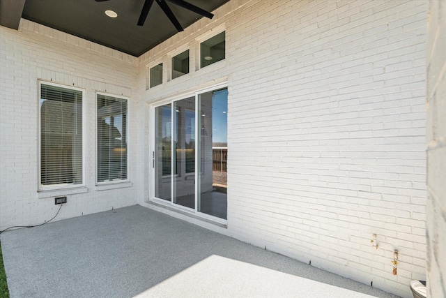 view of patio with ceiling fan