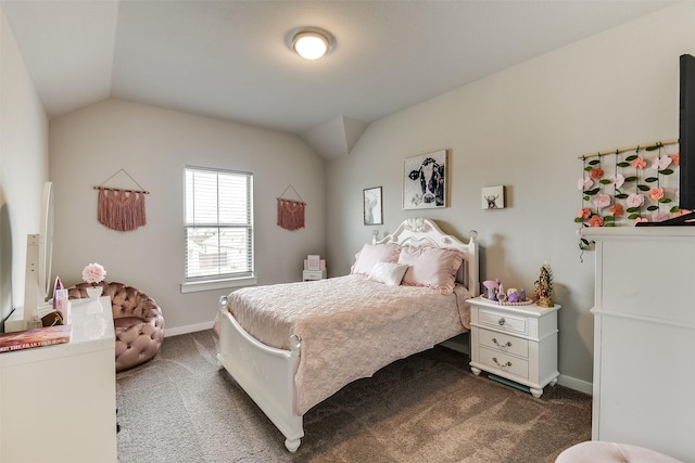 bedroom featuring vaulted ceiling, dark colored carpet, and baseboards