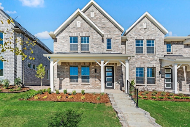 1073 Carnation Dr, Crowley, TX 76036 - view of front of house with brick siding, a porch, and a front yard
