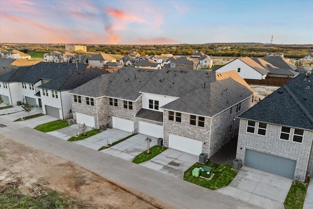 aerial view at dusk with a residential view