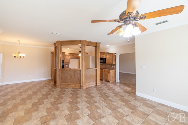 kitchen with black microwave, ornamental molding, ceiling fan with notable chandelier, and visible vents