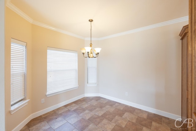 empty room featuring baseboards, a chandelier, and ornamental molding