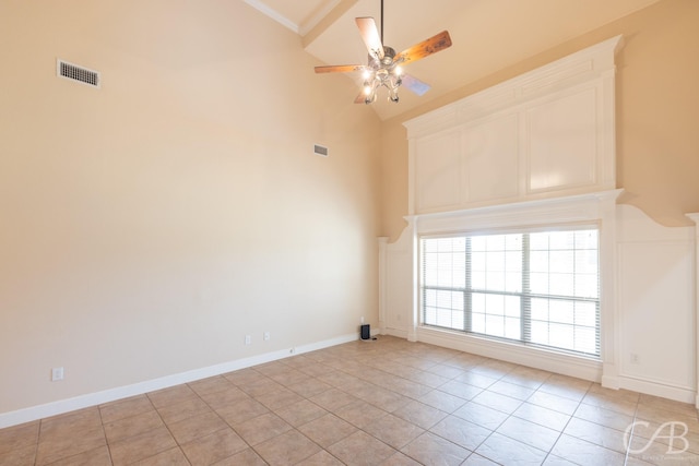 spare room with high vaulted ceiling, ceiling fan, visible vents, and light tile patterned flooring