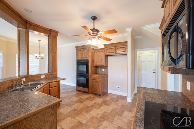 kitchen with ornamental molding, brown cabinets, a sink, and black appliances