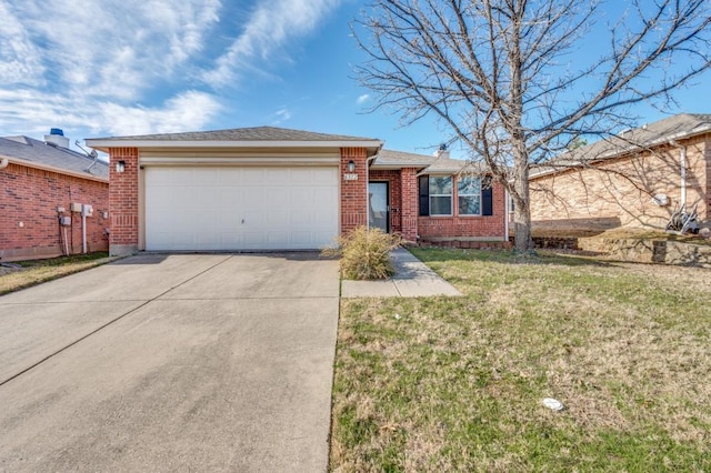 ranch-style home with a garage, a front yard, brick siding, and driveway