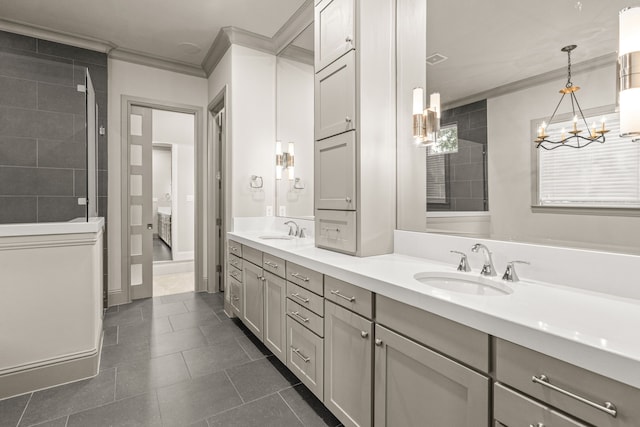 full bathroom with double vanity, ornamental molding, tile patterned flooring, and a sink